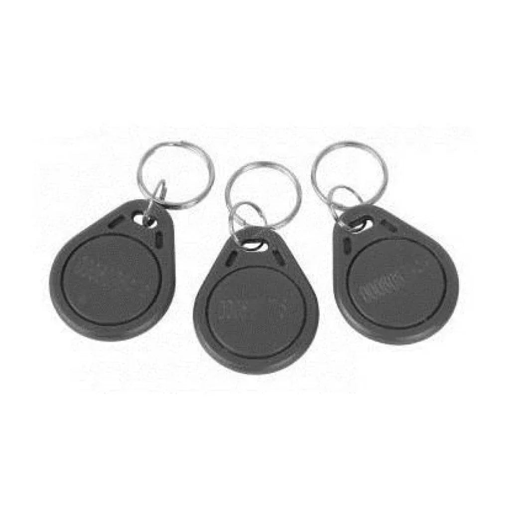 Set of three grey proximity key fobs with metal keyrings, security access control