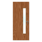 Internal oak fire door with vertical glazed panel and metal handle